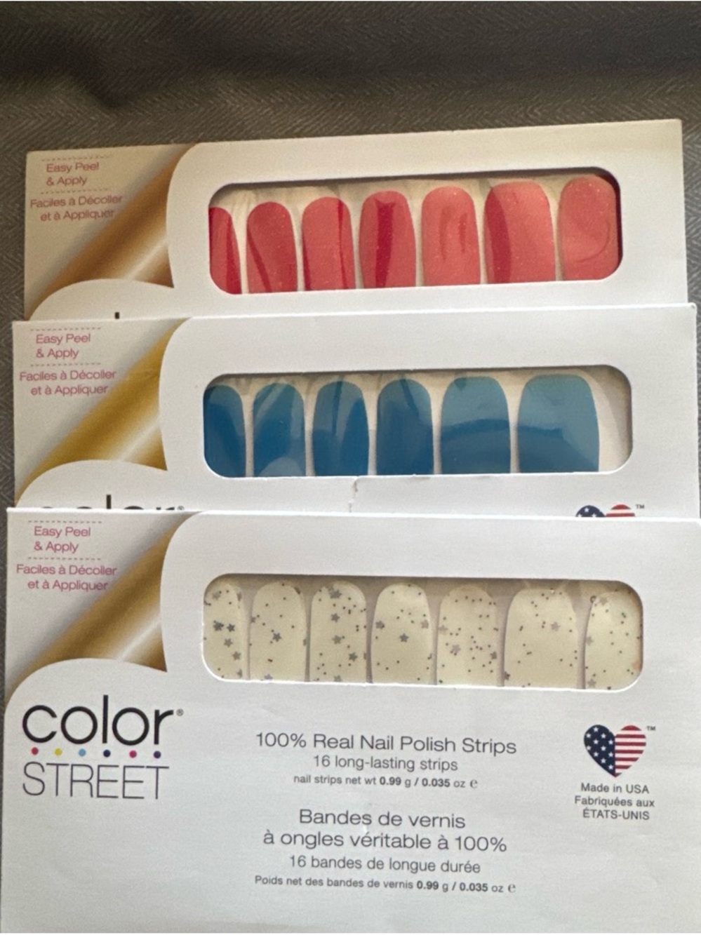 Color Street Nail Polish Strips - Red, Blue, Cream with Silver Stars - Picture 1 of 5